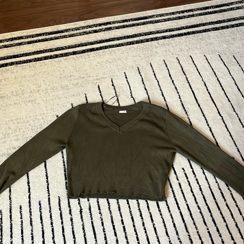 Green garage v-neck sweater